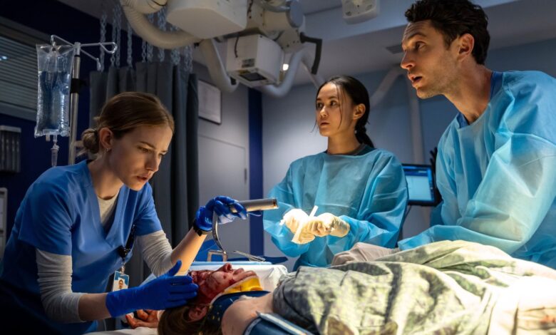 The cast of The Pitt operate on a patient