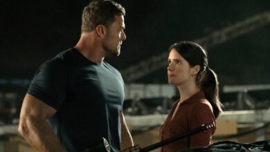 Zachary Beck holding a gun in Reacher Season 3.