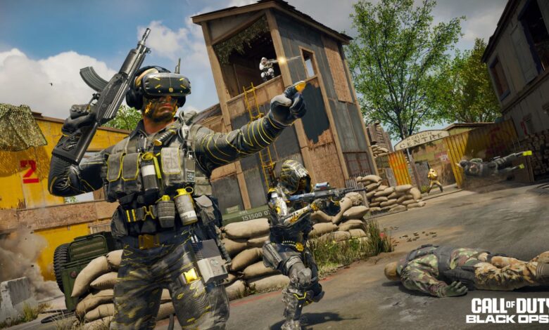 Three Double XP icons in front of a blurred image of Nuketown from Black Ops 6.