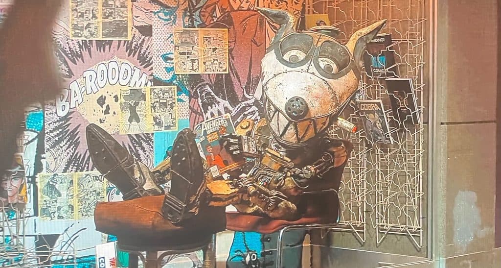 Um robô lendo um quadrinho no estado elétrico.
