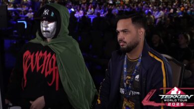 A photo of a player looking up at a 'Welcome to Evo' sign at Evo 2024.